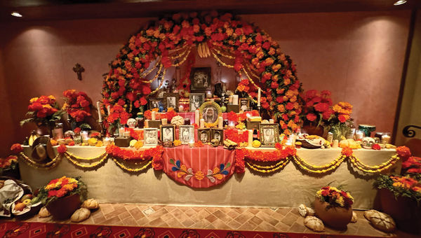 An ofrenda outside Plaza de Coco.