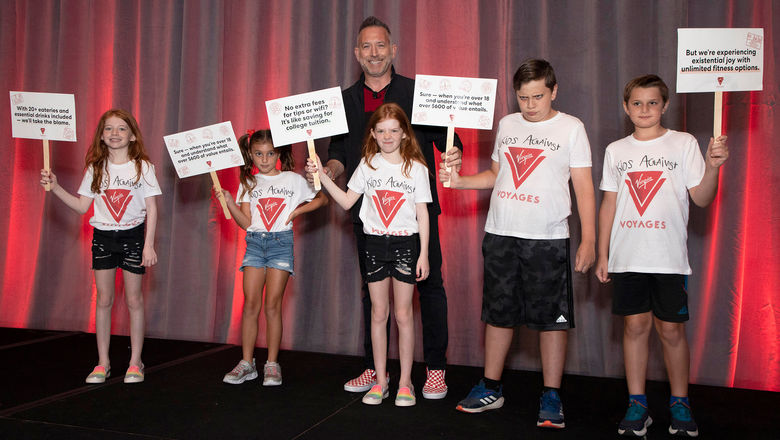 Different conference, same message: Virgin's John Diorio appeared at Global Travel Marketplace in 2022 with a group of kids "protesting" Virgin's no-children policy.