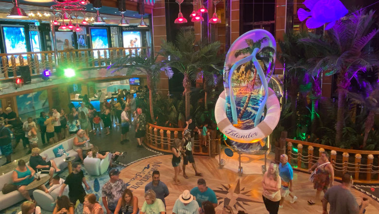 The atrium on Margaritaville at Sea's second ship, the Islander. Note the chandeliers of margarita glasses and the signature flip flop.