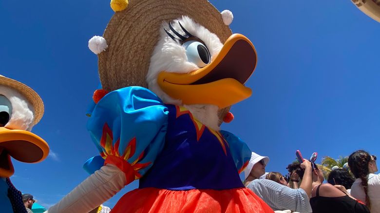 Disney Cruise Line on June 7 welcomed the first guests to Lookout Cay at Lighthouse Point, a private destination located on the Bahamian island of Eleuthera.  Pictured, Daisy Duck in her Junkanoo costume.