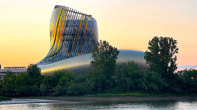 La Cite du Vin at sunset, as seen on a Garonne River dinner cruise.