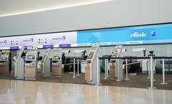 Hawaiian Airlines and Alaska Airlines now share a space at the San Francisco Airport.