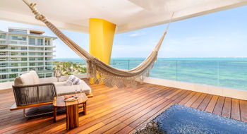 Corner suites at the Hotel Mousai Cancun feature wraparound terraces, hammocks and private plunge pools.