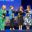 After Vacation Planners president Jenn Lee, second from right, was named godmother of AmaWaterways' AmaSintra, other AmaWaterways godmothers took the stage. From left, Cruise Planners' Michelle Fee, Jackie Friedman of Nexion and Debbie Fiorino of Dream Vacations and Cruise One. Alex Pinelo of AmaWaterways is at the right.