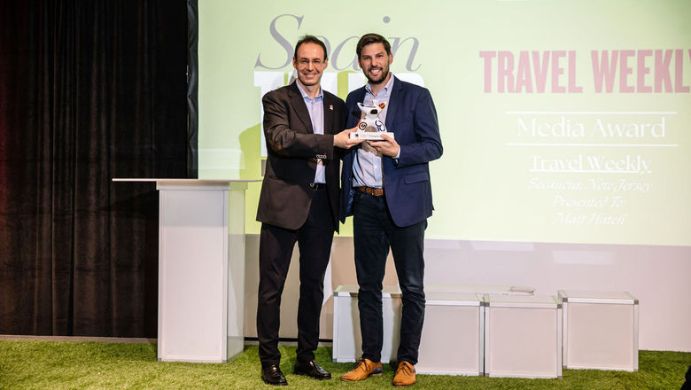 Travel Weekly business development director Matthew Hatch (left) accepts Turespaña's Tourism Sustainability media award on Travel Weekly's behalf from Magí Castelltort, consul for tourism affairs at the Consulate General of Spain in New York.